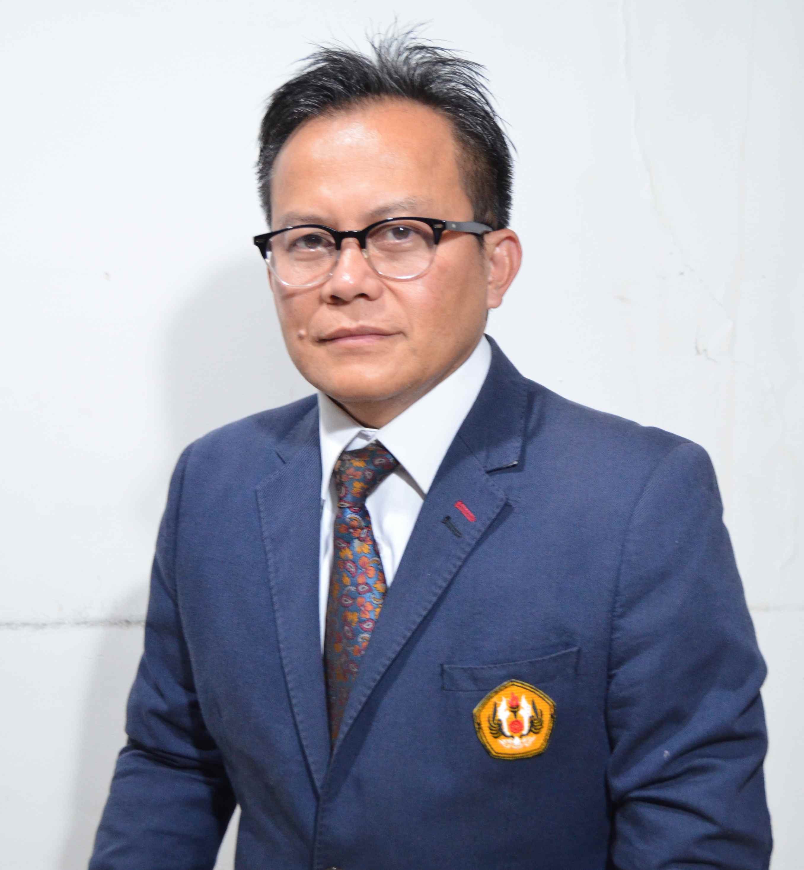 Toni Toharudin